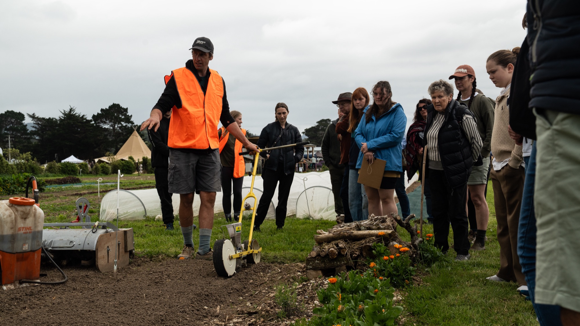 A hands-on demonstration with the cohort in the garden