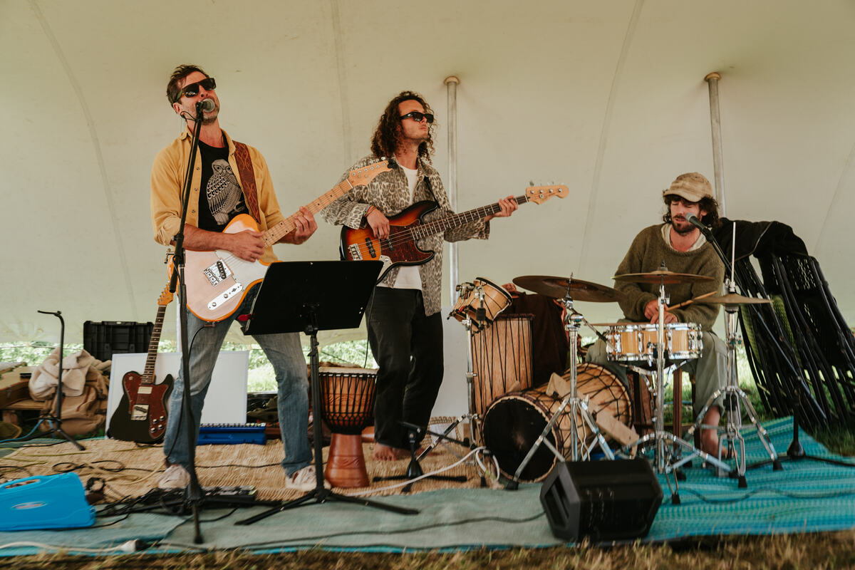 Live band playing under the marquee