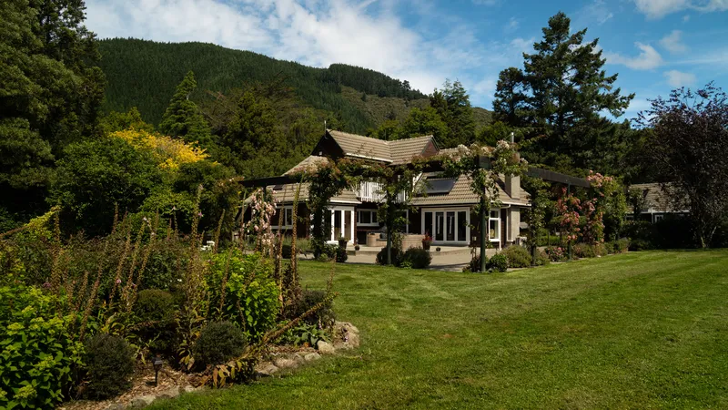 The Woodcote homestead across its lawn